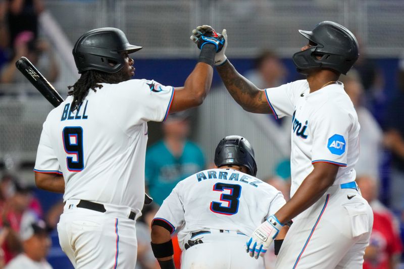 Sep 17, 2023; Miami, Florida, USA; Miami Marlins designated hitter Jorge Soler, right, celebrates with first baseman Josh Bell (9) after hitting a home run against the Atlanta Braves during the sixth inning at loanDepot Park. Mandatory Credit: Rich Storry-USA TODAY Sports