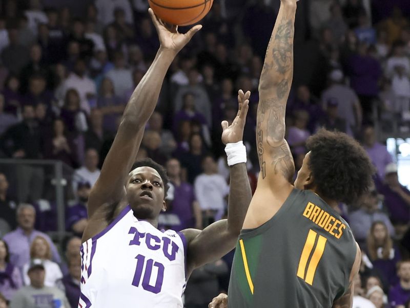 Feb 11, 2023; Fort Worth, Texas, USA;  TCU Horned Frogs guard Damion Baugh (10) shoots over Baylor Bears forward Jalen Bridges (11) during the first half at Ed and Rae Schollmaier Arena. Mandatory Credit: Kevin Jairaj-USA TODAY Sports