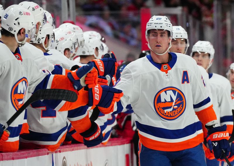 Dec 23, 2023; Raleigh, North Carolina, USA; New York Islanders center Brock Nelson (29) celebrates his goal against the Carolina Hurricanes during the first period at PNC Arena. Mandatory Credit: James Guillory-USA TODAY Sports