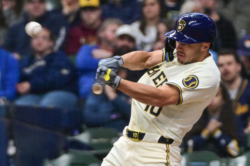 Apr 7, 2024; Milwaukee, Wisconsin, USA; Milwaukee Brewers center fielder Sal Frelick (10) hits a double to drive in two run in the first inning against the Seattle Mariners at American Family Field. Mandatory Credit: Benny Sieu-USA TODAY Sports