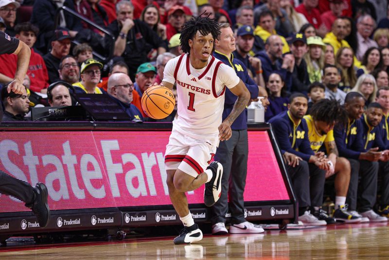 Feb 1, 2025; Piscataway, New Jersey, USA; Rutgers Scarlet Knights guard Jamichael Davis (1) dribbles up court during the second half against the Michigan Wolverines at Jersey Mike's Arena. Mandatory Credit: Vincent Carchietta-Imagn Images