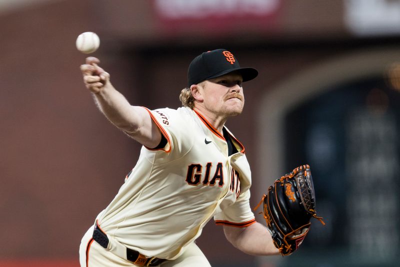 May 15, 2024; San Francisco, California, USA; San Francisco Giants starting pitcher Logan Webb (62) throws against the Los Angeles Dodgers during the fifth inning at Oracle Park. Mandatory Credit: John Hefti-USA TODAY Sports