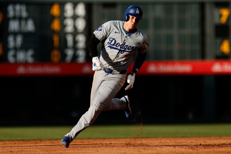 Jun 17, 2024; Denver, Colorado, USA; Los Angeles Dodgers designated hitter Shohei Ohtani (17) rounds second on an RBI in the second inning against the Colorado Rockies at Coors Field. Mandatory Credit: Isaiah J. Downing-USA TODAY Sports