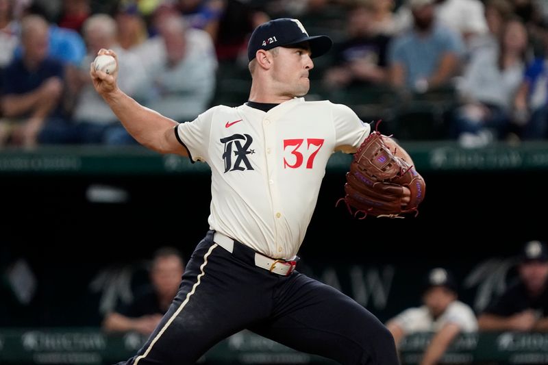 Jul 5, 2024; Arlington, Texas, USA; Texas Rangers pitcher David Robertson (37) throws to the plate during the seventh inning against the Tampa Bay Rays at Globe Life Field. Mandatory Credit: Raymond Carlin III-USA TODAY Sports