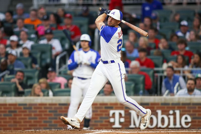 May 6, 2023; Atlanta, Georgia, USA; Atlanta Braves first baseman Matt Olson (28) hits a single against the Baltimore Orioles in the fourth inning at Truist Park. Mandatory Credit: Brett Davis-USA TODAY Sports
