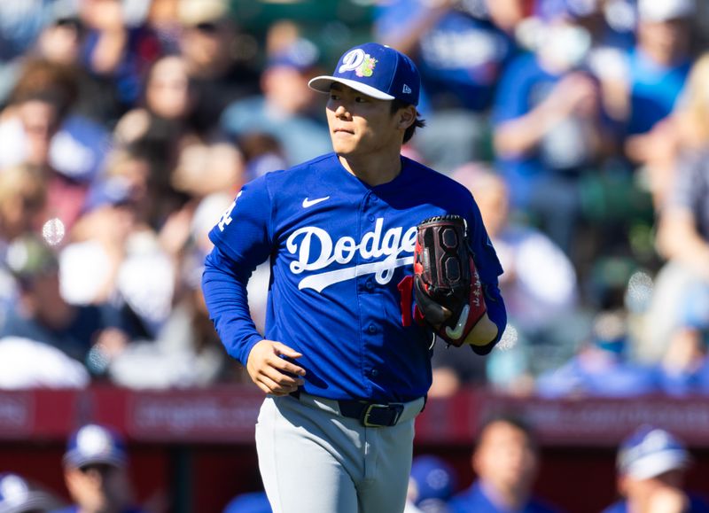 Feb 21, 2026; Tempe, Arizona, USA; Los Angeles Dodgers pitcher Yoshinobu Yamamoto against the Los Angeles Angels during a spring training game at Tempe Diablo Stadium. Mandatory Credit: Mark J. Rebilas-Imagn Images