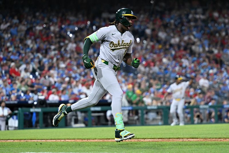 Jul 12, 2024; Philadelphia, Pennsylvania, USA; Oakland Athletics outfielder Lawrence Butler (4) reacts after hitting a two-run home run against the Philadelphia Phillies in the eighth inning at Citizens Bank Park. Mandatory Credit: Kyle Ross-USA TODAY Sports