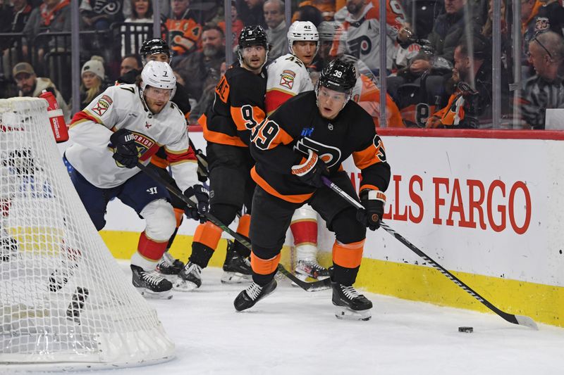 Jan 13, 2025; Philadelphia, Pennsylvania, USA; Philadelphia Flyers right wing Matvei Michkov (39) skates with the puck against the Florida Panthers during the first period at Wells Fargo Center. Mandatory Credit: Eric Hartline-Imagn Images