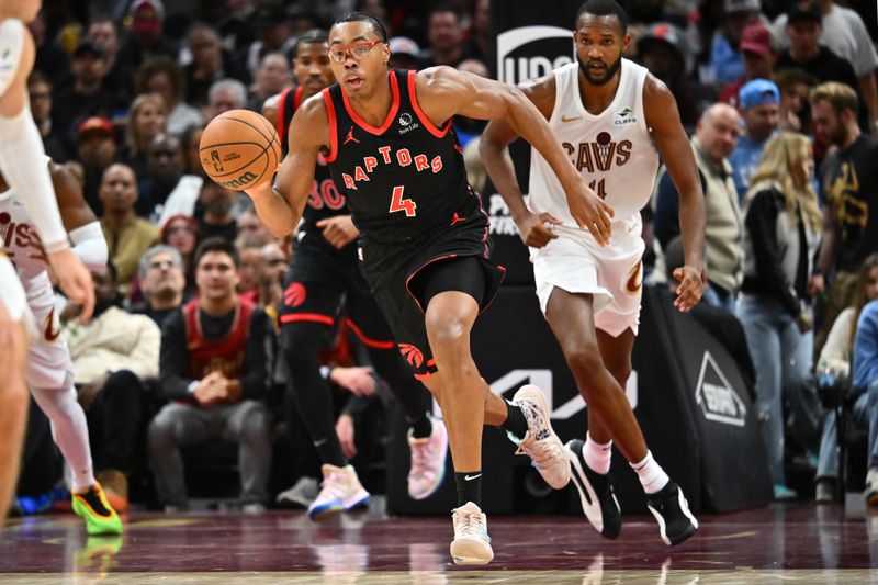 CLEVELAND, OHIO - NOVEMBER 24: Scottie Barnes #4 of the Toronto Raptors brings the ball up court during the fourth quarter against the Cleveland Cavaliers at Rocket Mortgage Fieldhouse on November 24, 2024 in Cleveland, Ohio. The Cavaliers defeated the Raptors 122-108.NOTE TO USER: User expressly acknowledges and agrees that, by downloading and or using this photograph, User is consenting to the terms and conditions of the Getty Images License Agreement. (Photo by Jason Miller/Getty Images)