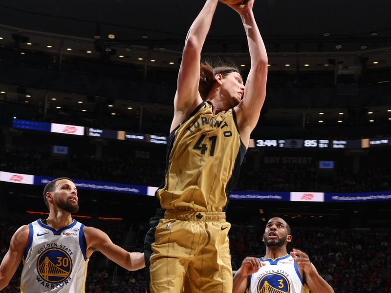 TORONTO, CANADA - MARCH 1:  Kelly Olynyk #41 of the Toronto Raptor grabs the rebound during the game on March 1, 2024 at the Scotiabank Arena in Toronto, Ontario, Canada.  NOTE TO USER: User expressly acknowledges and agrees that, by downloading and or using this Photograph, user is consenting to the terms and conditions of the Getty Images License Agreement.  Mandatory Copyright Notice: Copyright 2024 NBAE (Photo by Vaughn Ridley/NBAE via Getty Images)