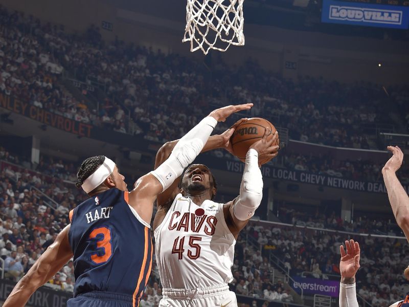 CLEVELAND, OH - APRIL 15: Donovan Mitchell #45 of the Cleveland Cavaliers drives to the basket during the game against the New York Knicks during the 2023 Round 1 Game 1 NBA Playoffs on April 15, 2023 at Rocket Mortgage FieldHouse in Cleveland, Ohio. NOTE TO USER: User expressly acknowledges and agrees that, by downloading and/or using this Photograph, user is consenting to the terms and conditions of the Getty Images License Agreement. Mandatory Copyright Notice: Copyright 2023 NBAE (Photo by David Liam Kyle/NBAE via Getty Images)