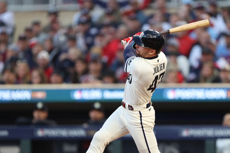 Oct 11, 2023; Minneapolis, Minnesota, USA; Minnesota Twins second baseman Edouard Julien (47) hits a double in the first inning against the Houston Astros during game four of the ALDS for the 2023 MLB playoffs at Target Field. Mandatory Credit: Jesse Johnson-USA TODAY Sports