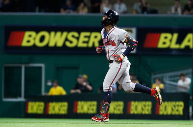 May 24, 2024; Pittsburgh, Pennsylvania, USA;  Atlanta Braves right fielder Ronald Acuna Jr. (13) circles the bases on a three-run home run against the Pittsburgh Pirates during the eighth inning at PNC Park. Mandatory Credit: Charles LeClaire-USA TODAY Sports