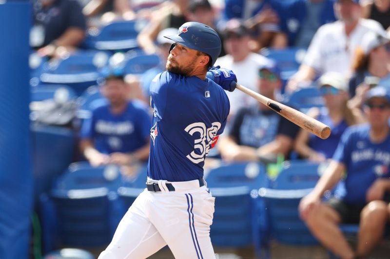 Mar 8, 2024; Dunedin, Florida, USA;  Toronto Blue Jays center fielder Nathan Lukes (38) hits a two-run rbi triple against the New York Yankees in the sixth inning at TD Ballpark. Mandatory Credit: Nathan Ray Seebeck-USA TODAY Sports