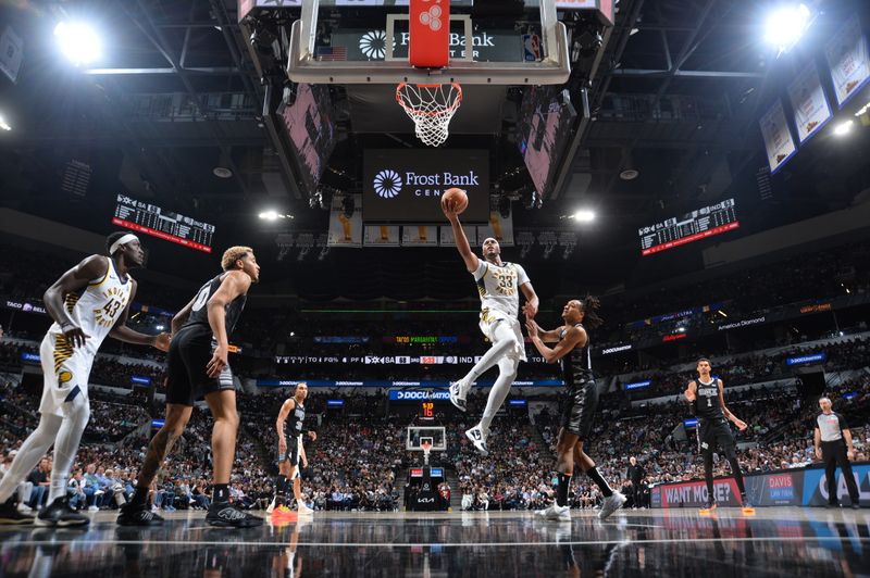 SAN ANTONIO, TX - MARCH 3: Myles Turner #33 of the Indiana Pacers drives to the basket during the game against the San Antonio Spurs on March 3, 2024 at the Frost Bank Center in San Antonio, Texas. NOTE TO USER: User expressly acknowledges and agrees that, by downloading and or using this photograph, user is consenting to the terms and conditions of the Getty Images License Agreement. Mandatory Copyright Notice: Copyright 2024 NBAE (Photos by Michael Gonzales/NBAE via Getty Images)