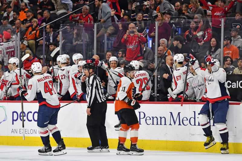 Apr 16, 2024; Philadelphia, Pennsylvania, USA; Washington Capitals celebrate win against the Philadelphia Flyers at Wells Fargo Center. Mandatory Credit: Eric Hartline-USA TODAY Sports