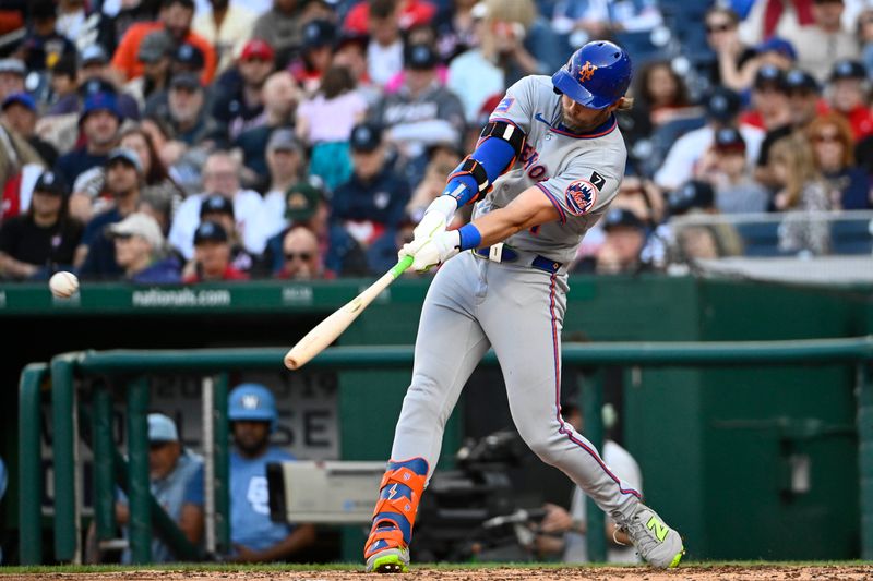 Apr 26, 2025; Washington, District of Columbia, USA; New York Mets second baseman Jeff McNeil (1) singles Washington Nationals during the fifth inning at Nationals Park. Mandatory Credit: Brad Mills-Imagn Images