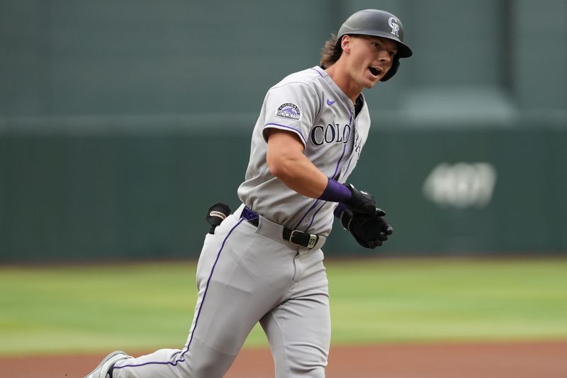 May 17, 2025; Phoenix, Arizona, USA; Colorado Rockies outfielder Jordan Beck (27) celebrates a home run in the first inning against the Arizona Diamondbacks at Chase Field. Mandatory Credit: Jacob Reiner-Imagn Images