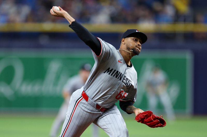 Sep 2, 2024; St. Petersburg, Florida, USA; Minnesota Twins pitcher Jorge Alcala (66) throws a pitch against the Tampa Bay Rays in the fifth inning at Tropicana Field. Mandatory Credit: Nathan Ray Seebeck-USA TODAY Sports