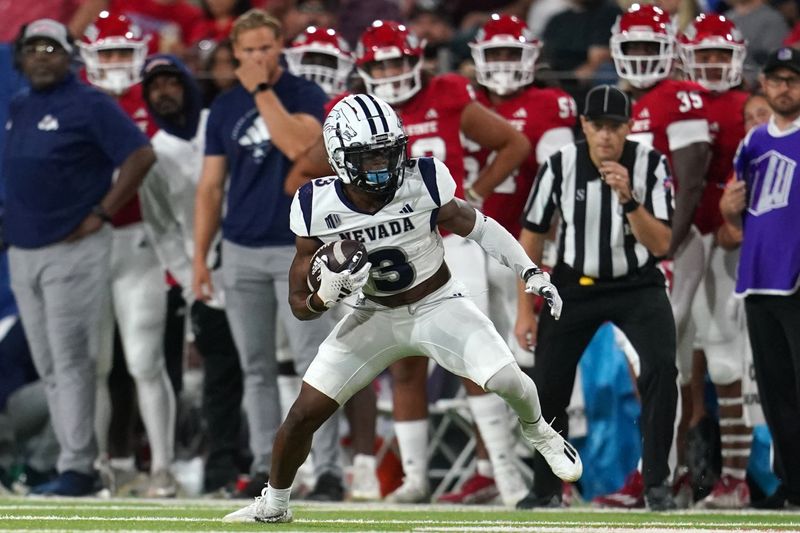 Sep 30, 2023; Fresno, California, USA; Nevada Wolf Pack wide receiver Jamaal Bell (3) runs with the ball after making a catch against the Fresno State Bulldogs in the first quarter at Valley Children's Stadium. Mandatory Credit: Cary Edmondson-USA TODAY Sports