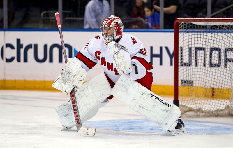 Jan 2, 2024; New York, New York, USA; Carolina Hurricanes goalie Pyotr Kochetkov (52) warms up before the first period against the New York Rangers at Madison Square Garden. Mandatory Credit: Danny Wild-USA TODAY Sports