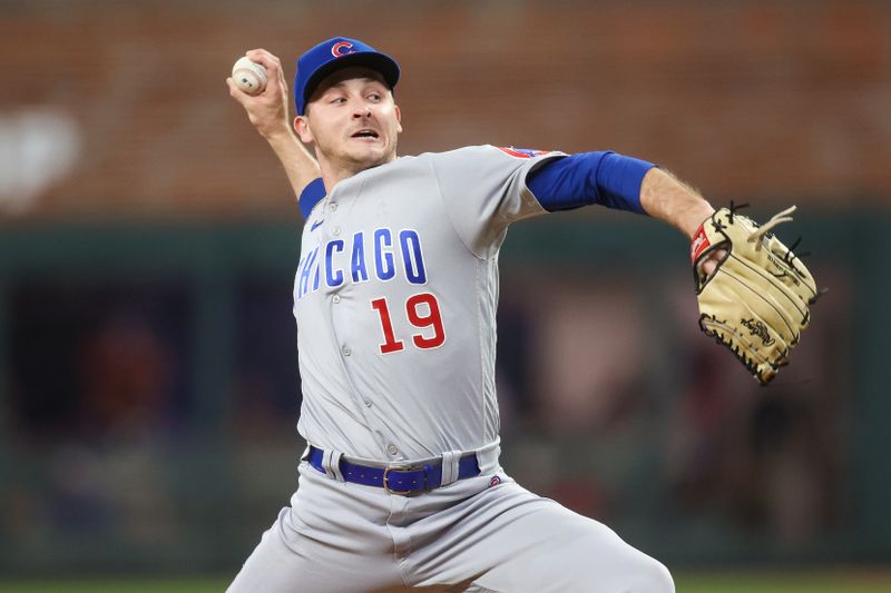 Sep 28, 2023; Atlanta, Georgia, USA; Chicago Cubs relief pitcher Hayden Wesneski (19) throws against the Atlanta Braves in the seventh inning at Truist Park. Mandatory Credit: Brett Davis-USA TODAY Sports