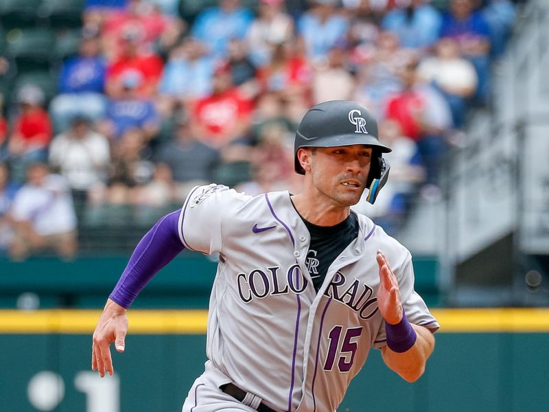 May 21, 2023; Arlington, Texas, USA; Colorado Rockies right fielder Randal Grichuk (15) rounds second base during the eighth inning against the Texas Rangers at Globe Life Field. Mandatory Credit: Andrew Dieb-USA TODAY Sports