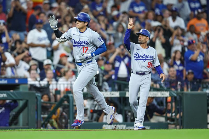 Jul 27, 2024; Houston, Texas, USA; Los Angeles Dodgers designated hitter Shohei Ohtani (17) rounds third base after hitting a home run during the third inning against the Houston Astros at Minute Maid Park. Mandatory Credit: Troy Taormina-USA TODAY Sports