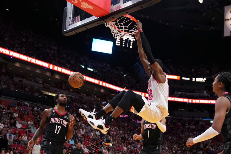 MIAMI, FLORIDA - FEBRUARY 10: Bam Adebayo #13 of the Miami Heat dunks the basketball during the fourth quarter against the Houston Rockets at Miami-Dade Arena on February 10, 2023 in Miami, Florida. NOTE TO USER: User expressly acknowledges and agrees that,? by downloading and or using this photograph,? User is consenting to the terms and conditions of the Getty Images License Agreement. (Photo by Eric Espada/Getty Images)