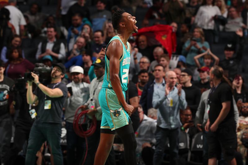 CHARLOTTE, NC - MARCH 27: Brandon Miller #24 of the Charlotte Hornets celebrates during the game on March 27, 2024 at Spectrum Center in Charlotte, North Carolina. NOTE TO USER: User expressly acknowledges and agrees that, by downloading and or using this photograph, User is consenting to the terms and conditions of the Getty Images License Agreement. Mandatory Copyright Notice: Copyright 2024 NBAE (Photo by Kent Smith/NBAE via Getty Images)