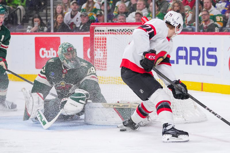 Apr 2, 2024; Saint Paul, Minnesota, USA; Ottawa Senators center Ridly Greig (71) shoots against the Minnesota Wild goaltender Marc-Andre Fleury (29) in the third period at Xcel Energy Center. Mandatory Credit: Brad Rempel-USA TODAY Sports