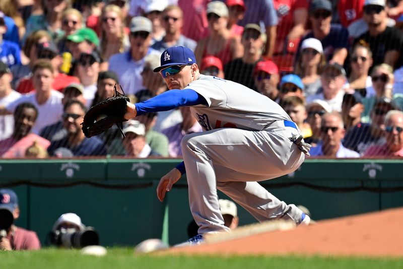 Aug 27, 2023; Boston, Massachusetts, USA; Los Angeles Dodgers first baseman Freddie Freeman (5) makes a play for an out against the Boston Red Sox during the fourth inning at Fenway Park. Mandatory Credit: Eric Canha-USA TODAY Sports