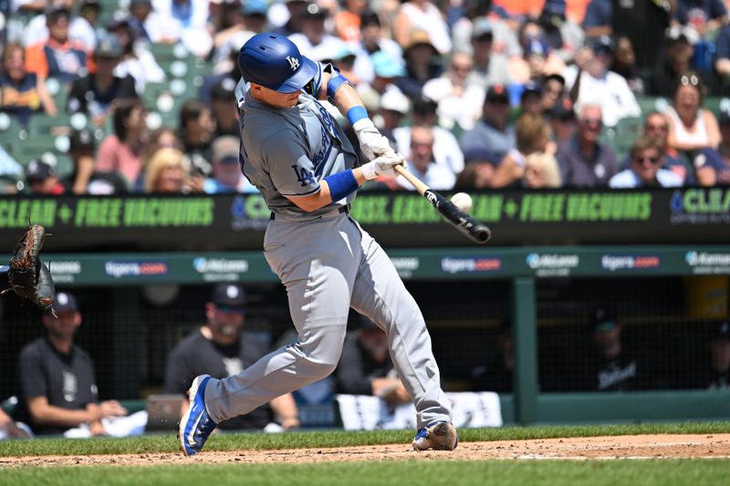 Jul 14, 2024; Detroit, Michigan, USA;  Los Angeles Dodgers catcher Will Smith (16) hits a single against the Detroit Tigers in the third inning at Comerica Park. Mandatory Credit: Lon Horwedel-USA TODAY Sports