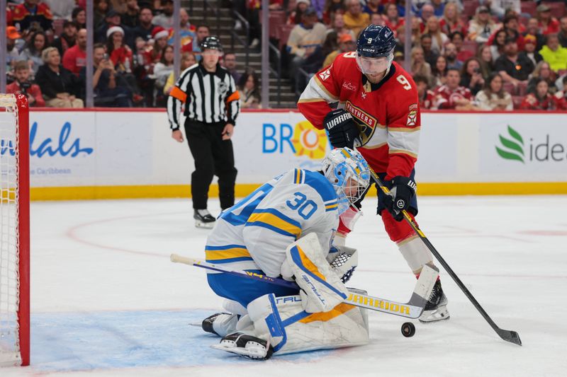 Dec 20, 2025; Sunrise, Florida, USA; St. Louis Blues goaltender Joel Hofer (30) makes a save against Florida Panthers center Sam Bennett (9) during the second period at Amerant Bank Arena. Mandatory Credit: Sam Navarro-Imagn Images