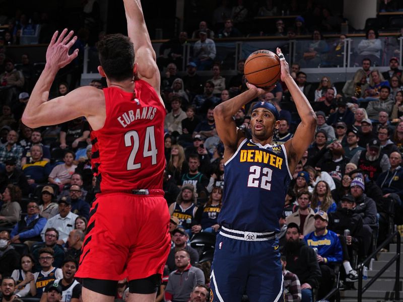 DENVER, CO - JANUARY 17: Zeke Nnaji #22 of the Denver Nuggets shoots the ball during the game against the Portland Trail Blazers on January 17, 2023 at the Ball Arena in Denver, Colorado. NOTE TO USER: User expressly acknowledges and agrees that, by downloading and/or using this Photograph, user is consenting to the terms and conditions of the Getty Images License Agreement. Mandatory Copyright Notice: Copyright 2023 NBAE (Photo by Bart Young/NBAE via Getty Images)