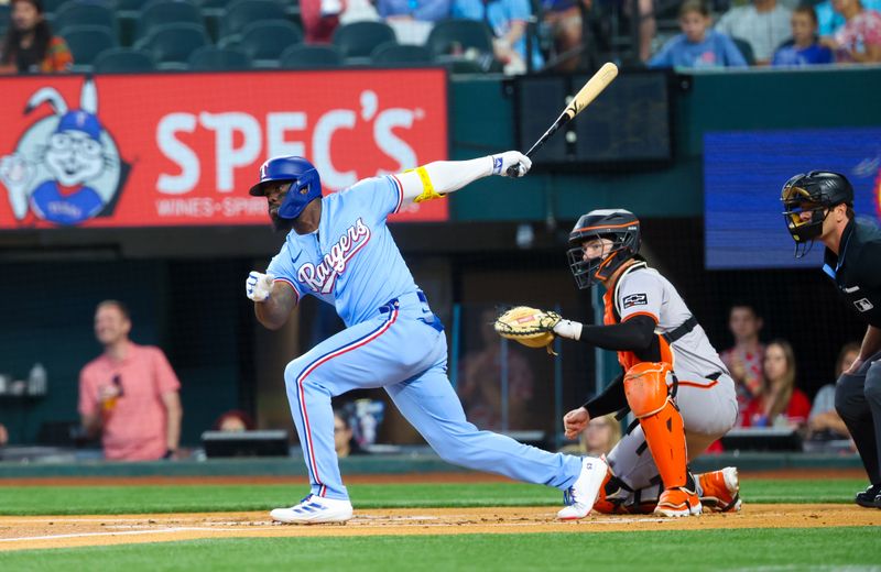 Jun 9, 2024; Arlington, Texas, USA; Texas Rangers right fielder Adolis García (53) hits a single during the first inning against the San Francisco Giants at Globe Life Field. Mandatory Credit: Kevin Jairaj-USA TODAY Sports