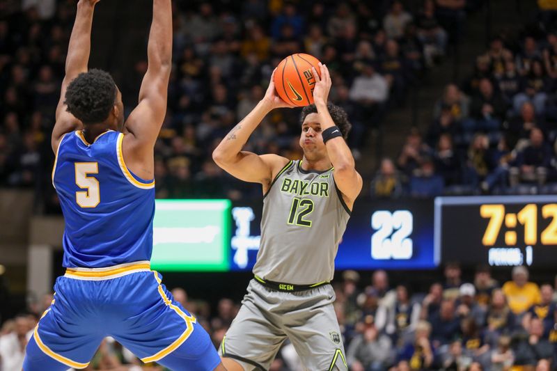 Jan 31, 2026; Morgantown, West Virginia, USA; Baylor Bears guard Michael Rataj (12) looks to pass the ball around West Virginia Mountaineers forward DJ Thomas (5) during the first half at Hope Coliseum. Mandatory Credit: Ben Queen-Imagn Images
