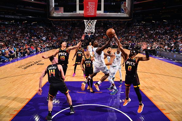 PHOENIX, AZ - NOVEMBER 15: Anthony Edwards #5 of the Minnesota Timberwolves drives to the basket during the game against the Phoenix Suns on November 15, 2023 at Footprint Center in Phoenix, Arizona. NOTE TO USER: User expressly acknowledges and agrees that, by downloading and or using this photograph, user is consenting to the terms and conditions of the Getty Images License Agreement. Mandatory Copyright Notice: Copyright 2023 NBAE (Photo by Barry Gossage/NBAE via Getty Images)