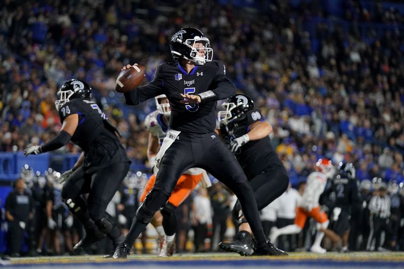 Nov 16, 2024; San Jose, California, USA; San Jose State Spartans quarterback Walker Eget (5) throws a pass against the Boise State Broncos in the third quarter at CEFCU Stadium. Mandatory Credit: Cary Edmondson-Imagn Images