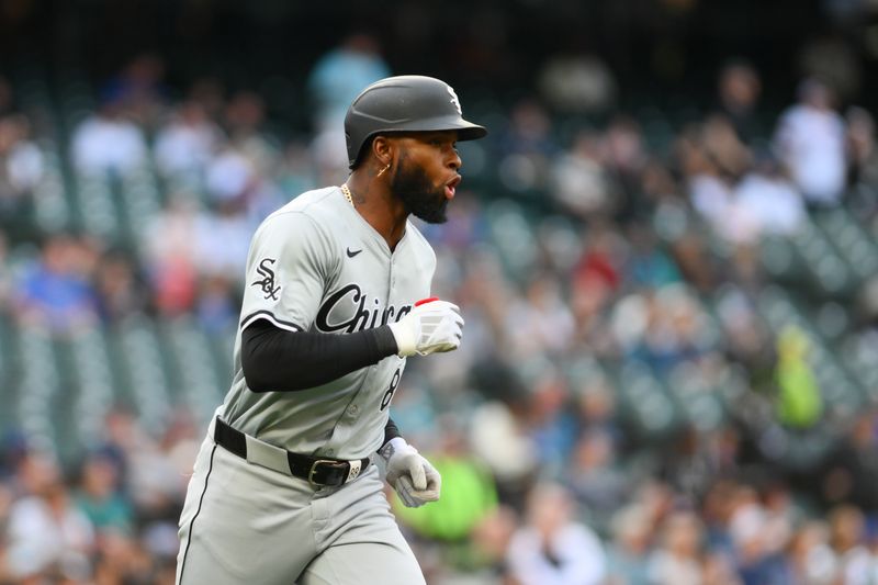 Jun 13, 2024; Seattle, Washington, USA; Chicago White Sox center fielder Luis Robert Jr. (88) runs the bases after hitting a home run against the Seattle Mariners during the third inning at T-Mobile Park. Mandatory Credit: Steven Bisig-USA TODAY Sports