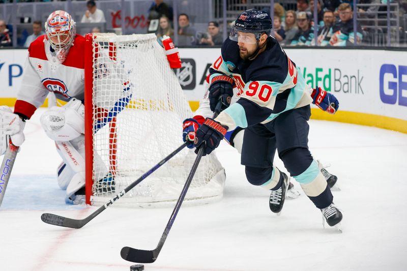 Mar 24, 2024; Seattle, Washington, USA; Seattle Kraken left wing Tomas Tatar (90) skates with the puck against the Montreal Canadiens during the first period at Climate Pledge Arena. Mandatory Credit: Joe Nicholson-USA TODAY Sports