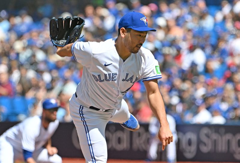 Aug 27, 2023; Toronto, Ontario, CAN; Toronto Blue Jays starting pitcher Yusei Kikuchi (16) delivers a pitch against the Cleveland Guardians in the first inning at Rogers Centre. Mandatory Credit: Dan Hamilton-USA TODAY Sports