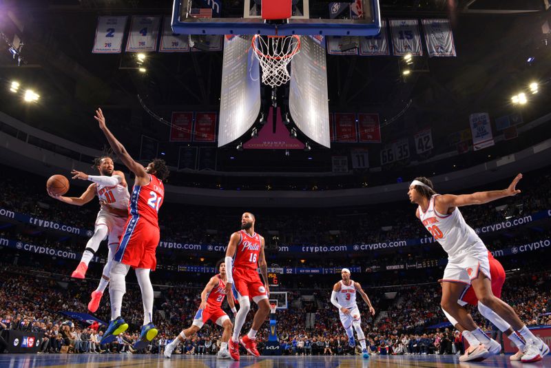 PHILADELPHIA, PA - NOVEMBER 12: Jalen Brunson #11 of the New York Knicks passes the ball during the game against the Philadelphia 76ers during the Emirates NBA Cup game on November 12, 2024 at the Wells Fargo Center in Philadelphia, Pennsylvania NOTE TO USER: User expressly acknowledges and agrees that, by downloading and/or using this Photograph, user is consenting to the terms and conditions of the Getty Images License Agreement. Mandatory Copyright Notice: Copyright 2024 NBAE (Photo by Jesse D. Garrabrant/NBAE via Getty Images)