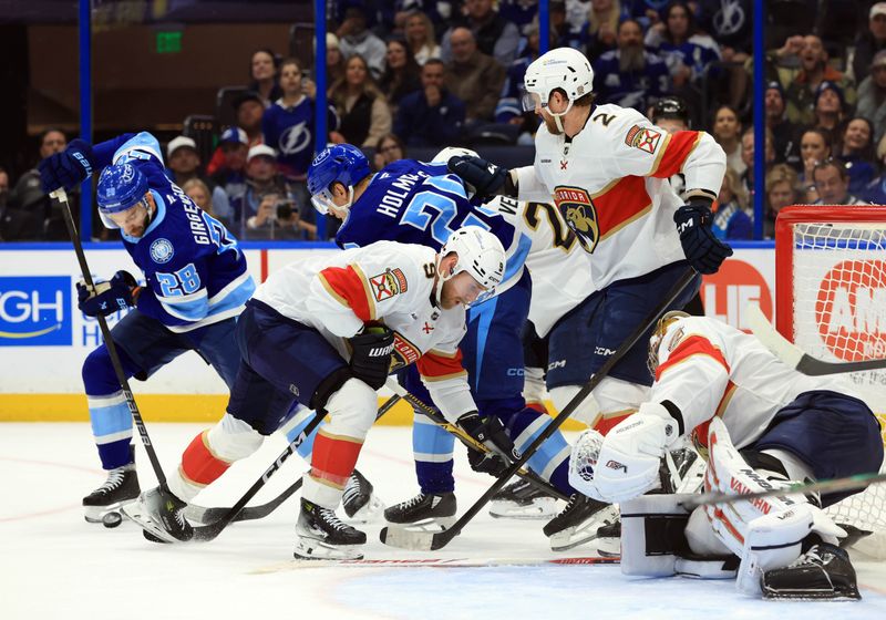 Feb 5, 2026; Tampa, Florida, USA; Tampa Bay Lightning center Zemgus Girgensons (28) scores a goal against the Florida Panthers during the first period at Benchmark International Arena. Mandatory Credit: Kim Klement Neitzel-Imagn Images