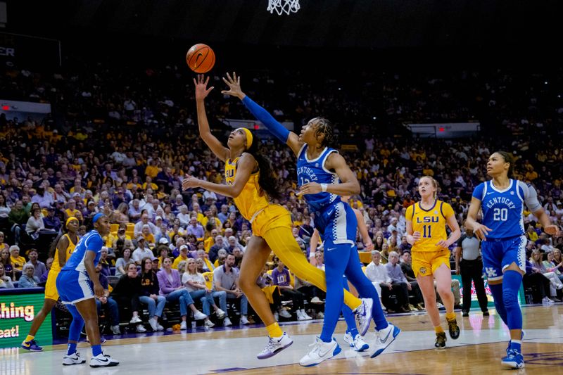 Mar 3, 2024; Baton Rouge, Louisiana, USA; LSU Lady Tigers forward Angel Reese (10) shoots against Kentucky Wildcats forward Ajae Petty (13) during the first half at Pete Maravich Assembly Center. Mandatory Credit: Matthew Hinton-USA TODAY Sports