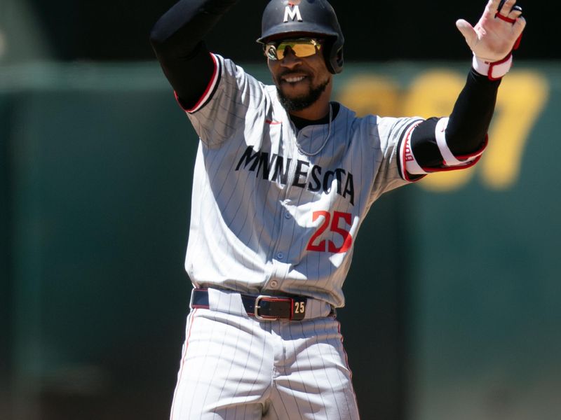 Jun 23, 2024; Oakland, California, USA; Minnesota Twins center fielder Byron Buxton (25) celebrates his RBI double against the Oakland Athletics during the seventh inning at Oakland-Alameda County Coliseum. Mandatory Credit: D. Ross Cameron-USA TODAY Sports