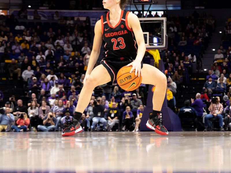 Feb 2, 2023; Baton Rouge, Louisiana, USA;  Georgia Lady Bulldogs guard Alisha Lewis (23) dribbles against the LSU Lady Tigers during the second half at Pete Maravich Assembly Center. Mandatory Credit: Stephen Lew-USA TODAY Sports