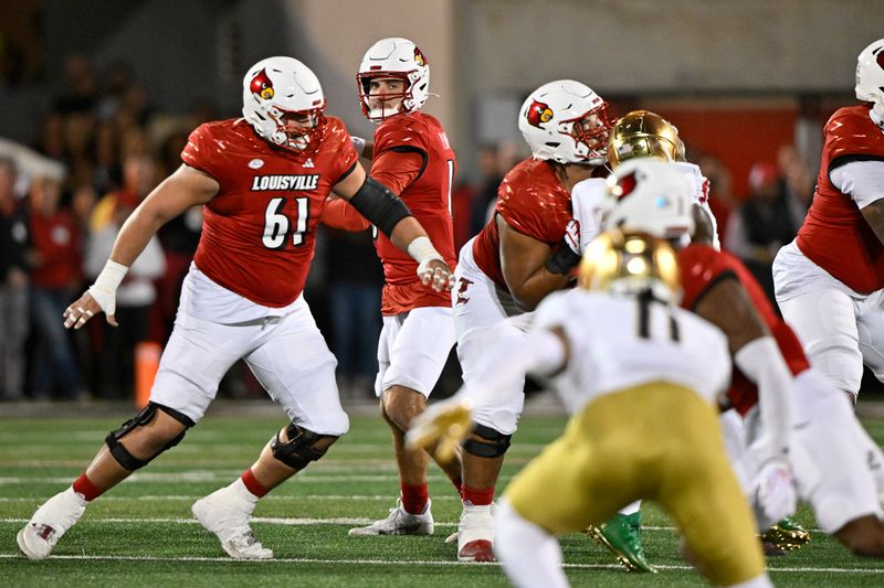 Oct 7, 2023; Louisville, Kentucky, USA;  Louisville Cardinals quarterback Jack Plummer (13) looks to pass against the Notre Dame Fighting Irish during the first quarter at L&N Federal Credit Union Stadium. Mandatory Credit: Jamie Rhodes-USA TODAY Sports