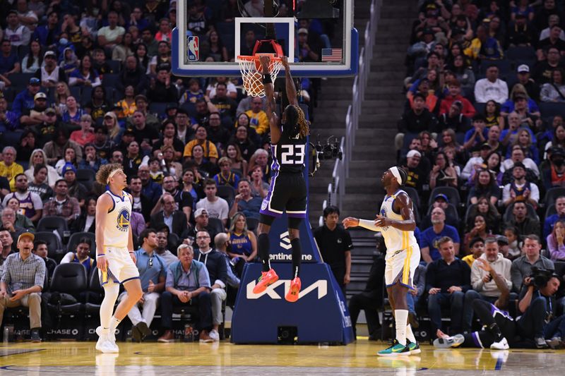 SAN FRANCISCO, CA - OCTOBER 11: Keon Ellis #23 of the Sacramento Kings dunks the ball during the game against the Golden State Warriors during a NBA Preseason game on October 11, 2024 at Chase Center in San Francisco, California. NOTE TO USER: User expressly acknowledges and agrees that, by downloading and or using this photograph, user is consenting to the terms and conditions of Getty Images License Agreement. Mandatory Copyright Notice: Copyright 2024 NBAE (Photo by Noah Graham/NBAE via Getty Images)