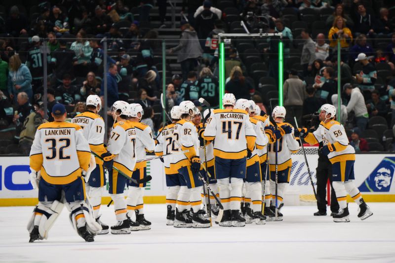 Mar 16, 2024; Seattle, Washington, USA; The Nashville Predators celebrate after defeating the Seattle Kraken at Climate Pledge Arena. Mandatory Credit: Steven Bisig-USA TODAY Sports